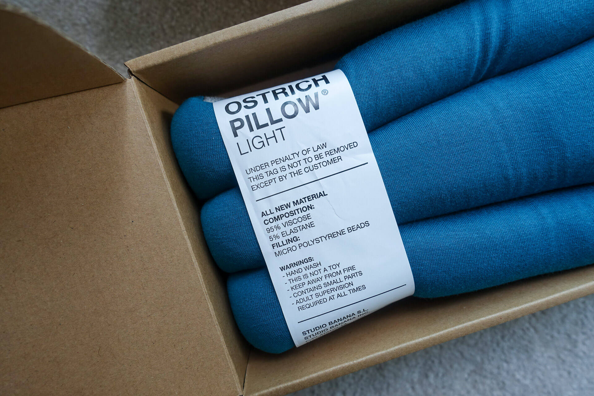 ostrichpillow light versatile pillow in box